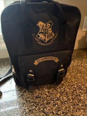Warner Bros. Black Hogwarts Crest Backpack with Gold Accents